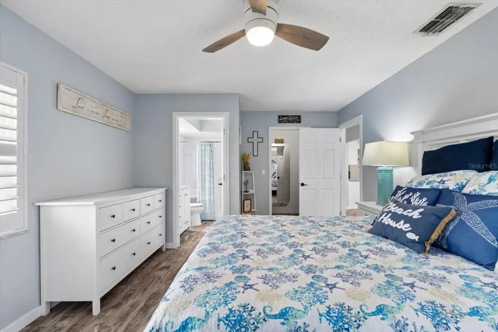 Primary bedroom with walk in closet and en suite.