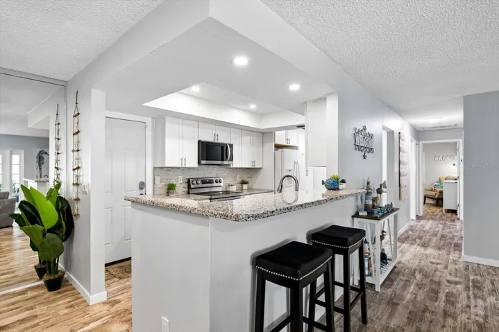 Open concept kitchen with bar