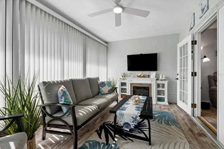 French doors leading to enclosed Lanai off the living room