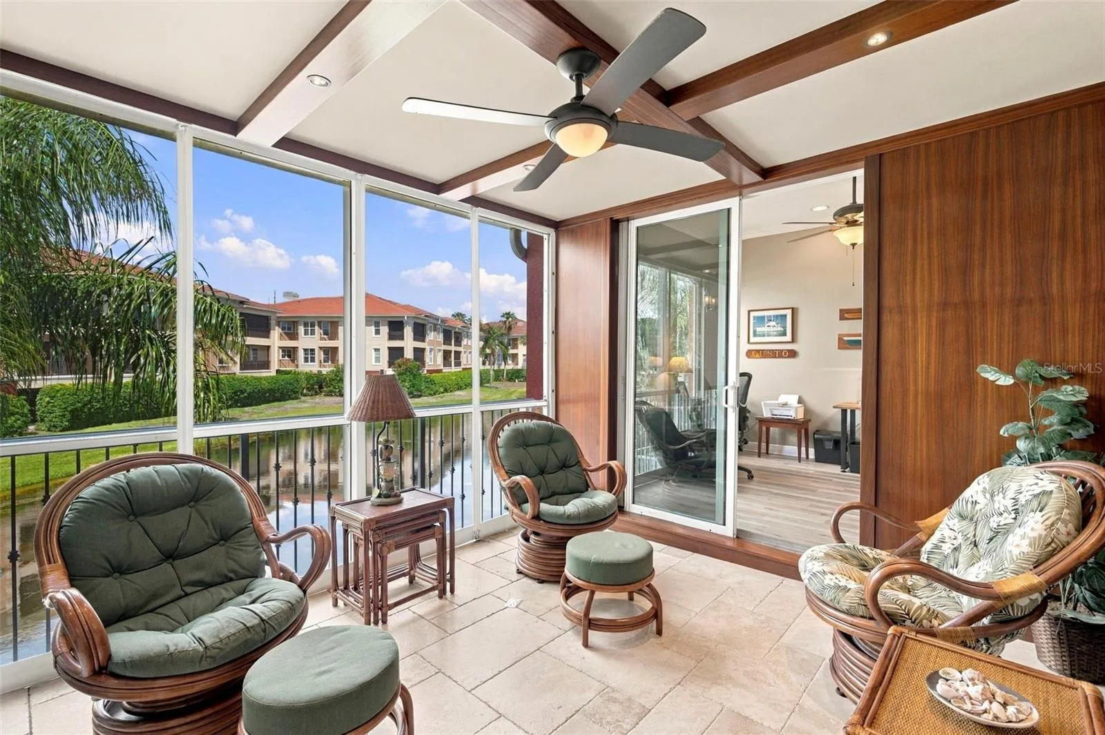 One of a kind outdoor space showcases beautiful African Mahogany trim, teak wall panels, and an impressive 14 coats of varnish, reflecting the craftsmanship