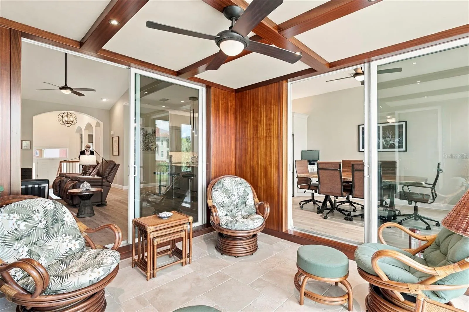 One of a kind outdoor space showcases beautiful African Mahogany trim, teak wall panels, and an impressive 14 coats of varnish, reflecting the craftsmanship