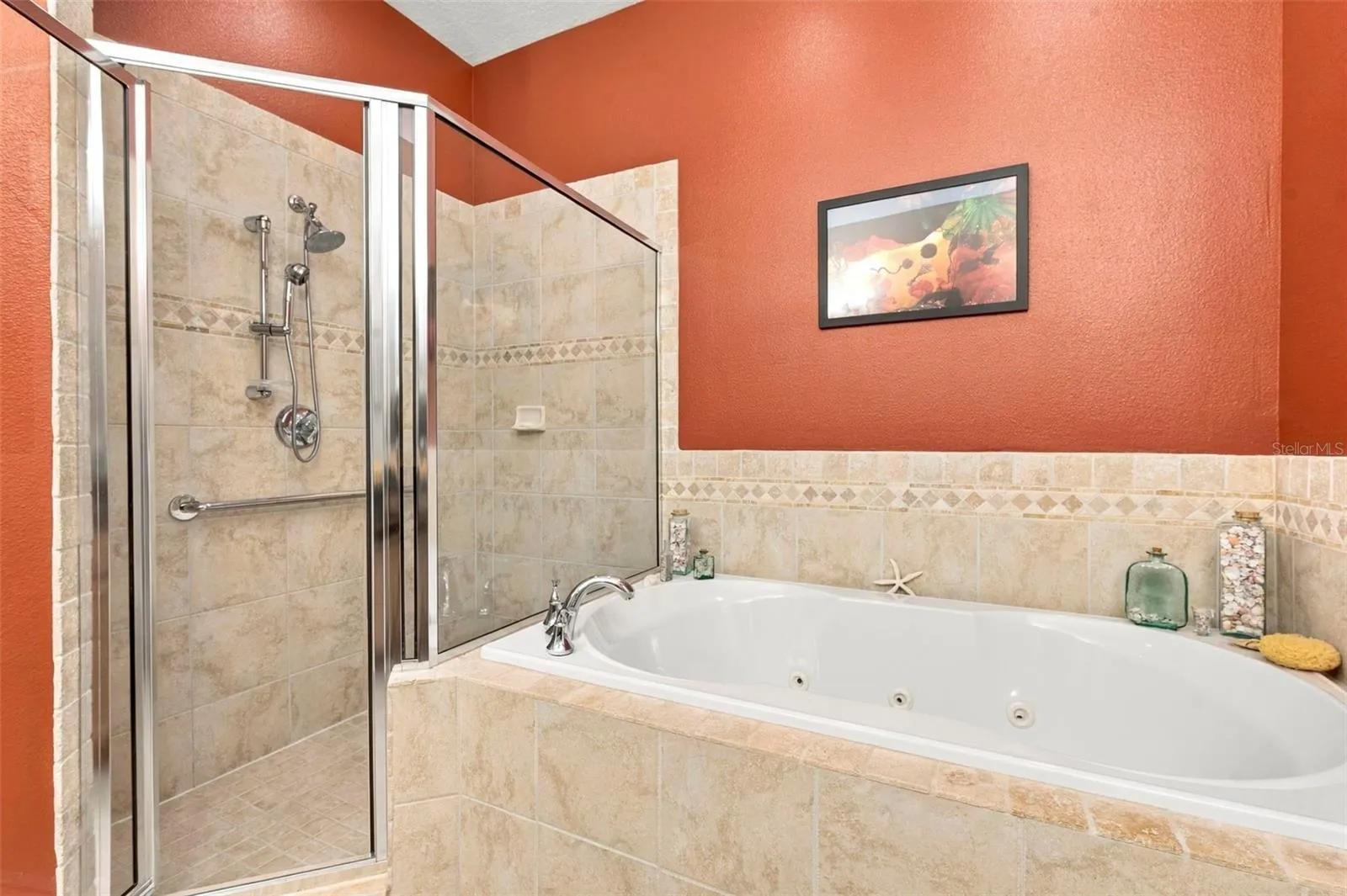 Primary Bedroom with En-Suite Bathroom, His & Her Walk-in Closets, Double sinks with Granite countertops, jacuzzi tub, separate shower