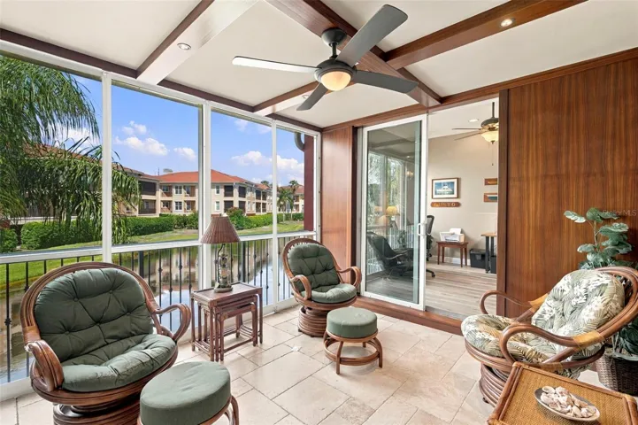 One of a kind outdoor space showcases beautiful African Mahogany trim, teak wall panels, and an impressive 14 coats of varnish, reflecting the craftsmanship