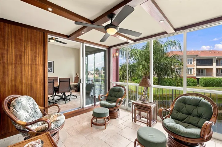 One of a kind outdoor space showcases beautiful African Mahogany trim, teak wall panels, and an impressive 14 coats of varnish, reflecting the craftsmanship