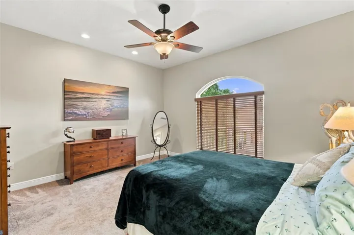 Primary Bedroom with En-Suite Bathroom, His & Her Walk-in Closets, Double sinks with Granite countertops, jacuzzi tub, separate shower