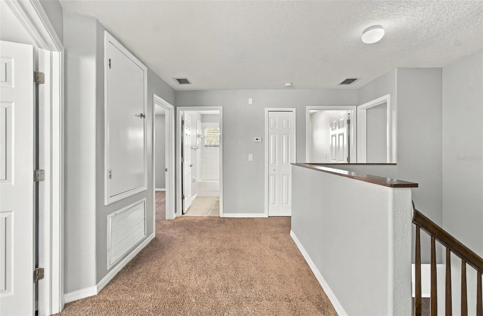Upstairs Hallway to other bedrooms, Laundry Room. A/C C.oset