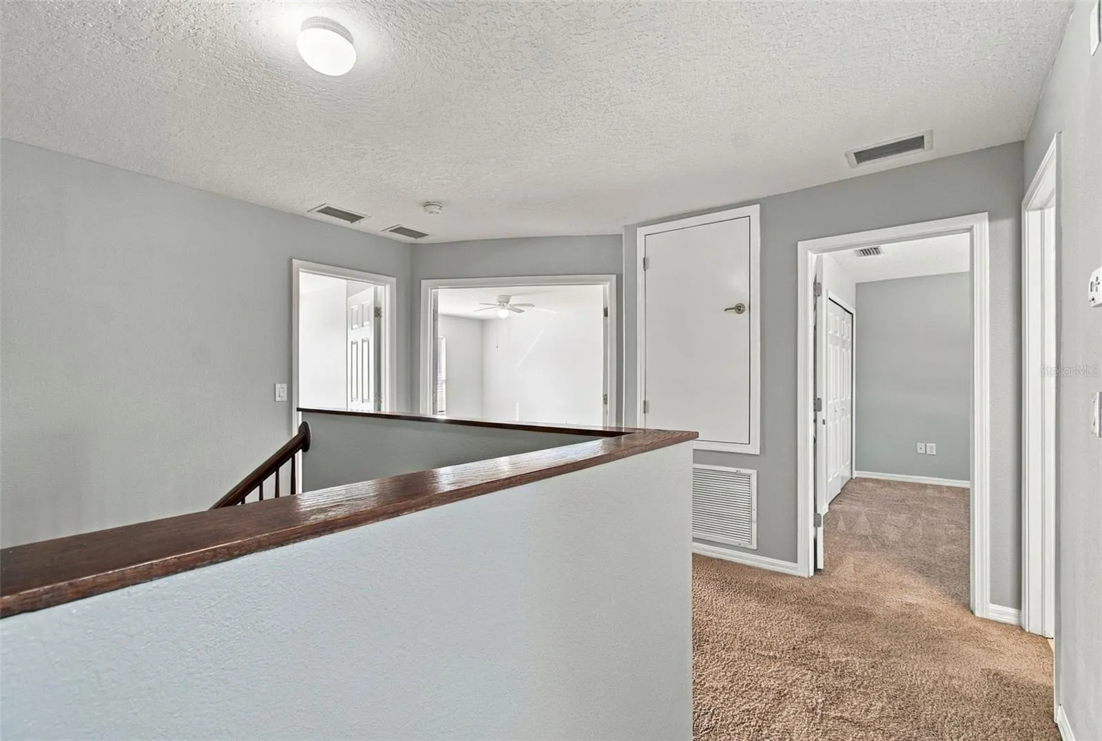 Upstairs vire to Peimary Bedroom, Bonus or 4th Bedroom, A/C Closet,2nd and 3rd Bedrooms