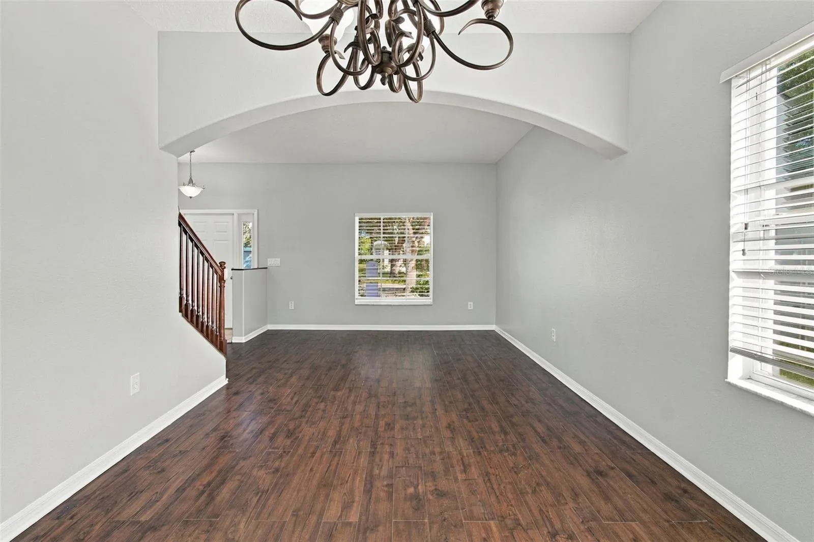 Dining Room with plenty of natural light and chandelier