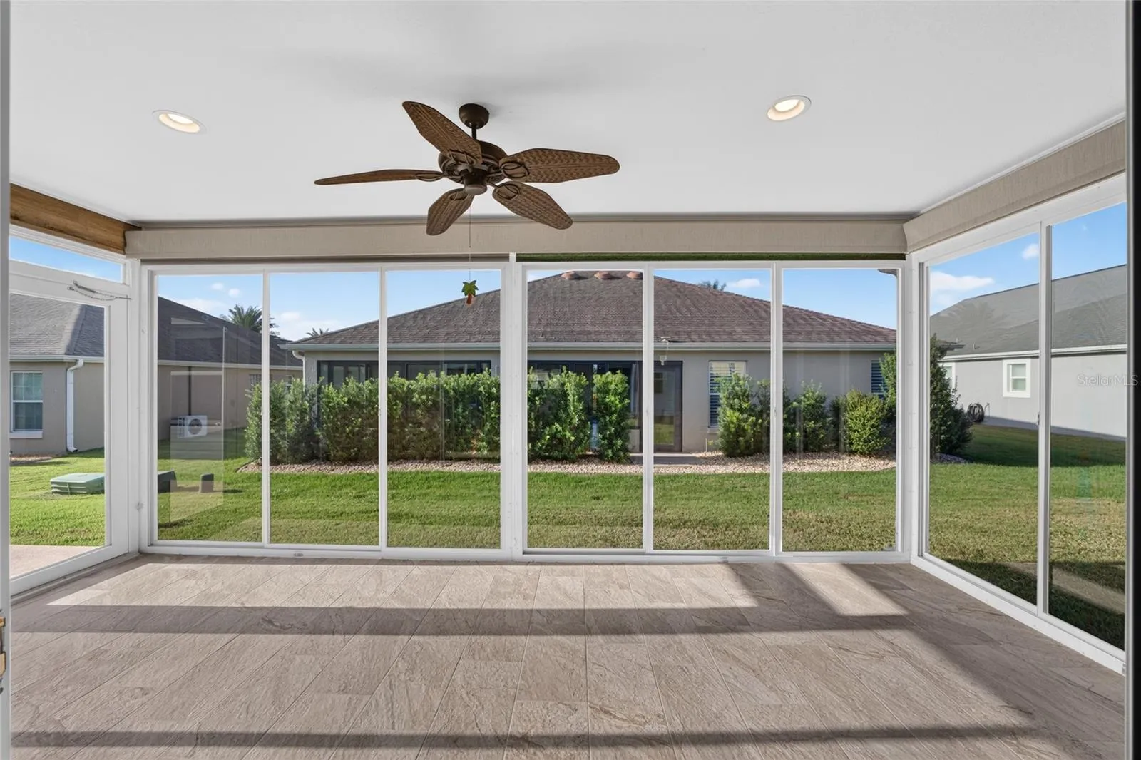 Glass Sliders in Florida Room with Screens