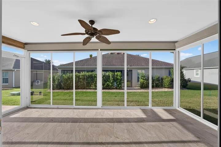 Glass Sliders in Florida Room with Screens