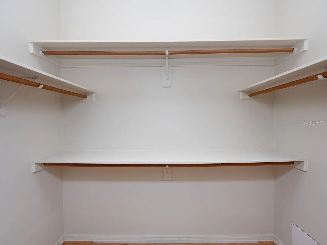 walk in closet in primary bedroom
