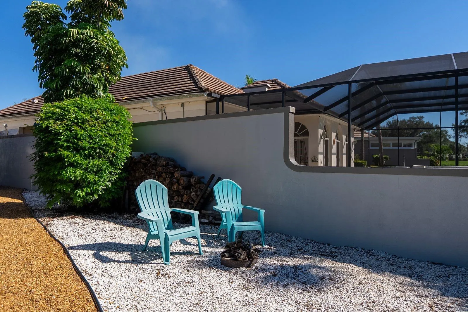 fire pit on side of house