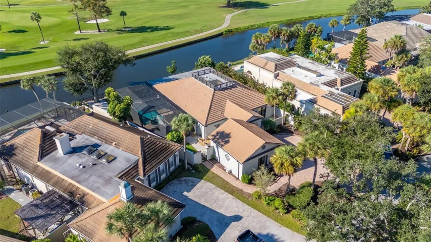 aerial of house and pond