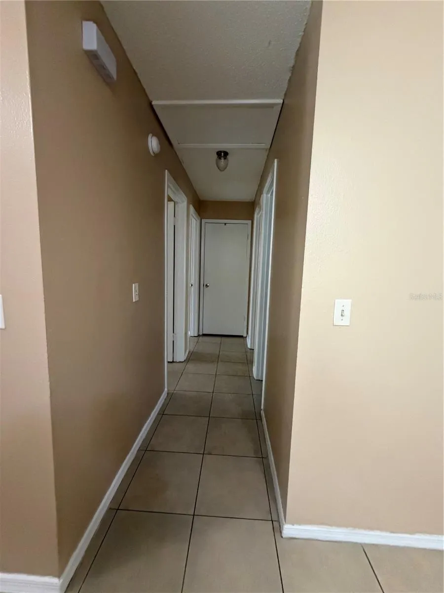 Hallway to bedrooms and bath