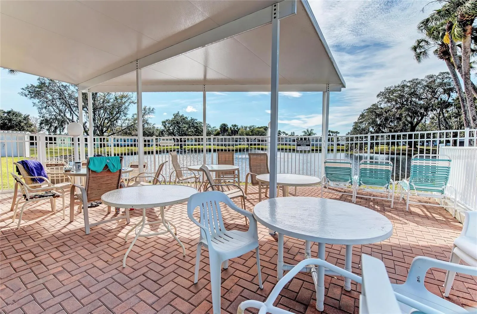 Covered gathering area at pool and clubhouse