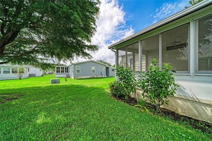 Nice shade tree from sunroom. with this lot you are not right on top of your neighbors. add rolldown shades for privacy. With the directional exposure you get morning sun and are spared the blazing afternoon sun