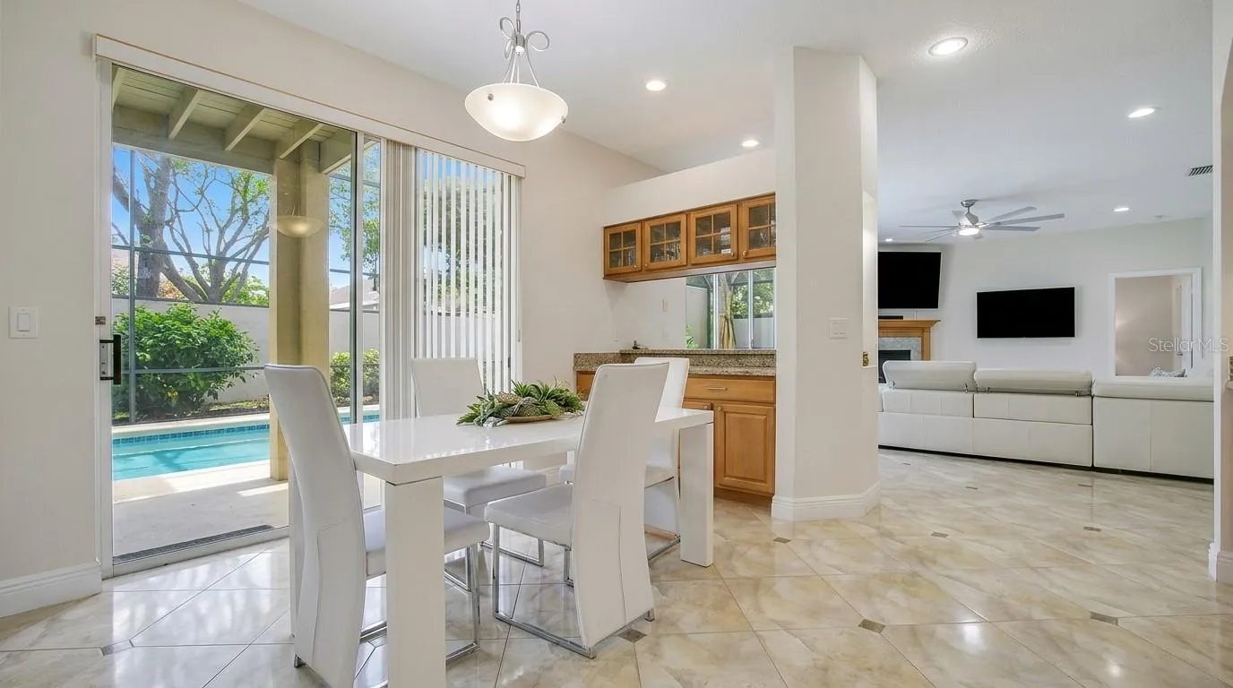 Sliding glass door leading to the pool area.