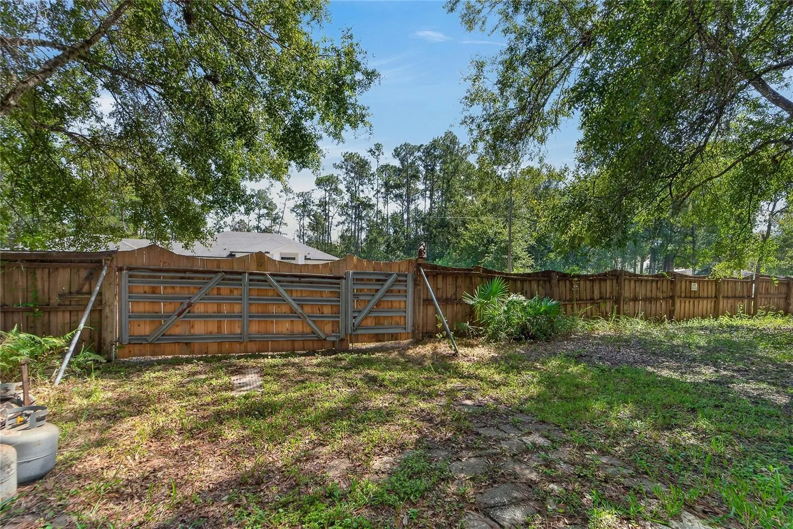 Wooden Fence with gate on Olcott Drive