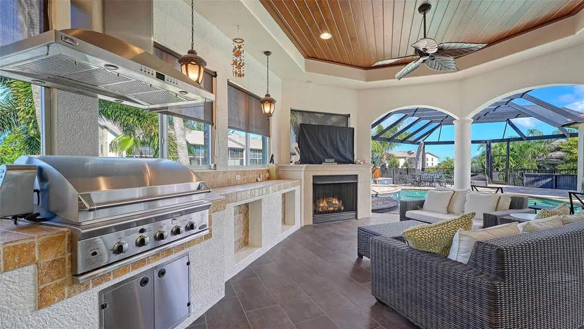 Under cover outdoor Kitchen complete with Fireplace and T.V.