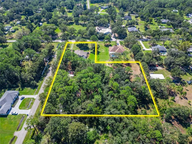 3.66 Acres with entrances on Olcott Dr and Lindenhurst.