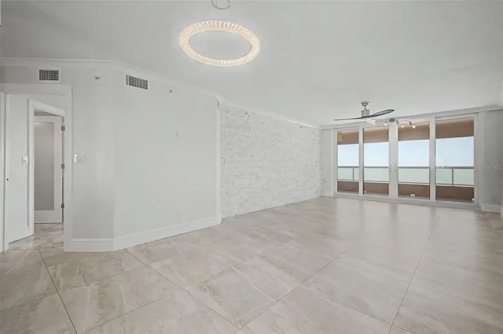 Large Living / Great room with Sliders leading to the Gulf front Balcony