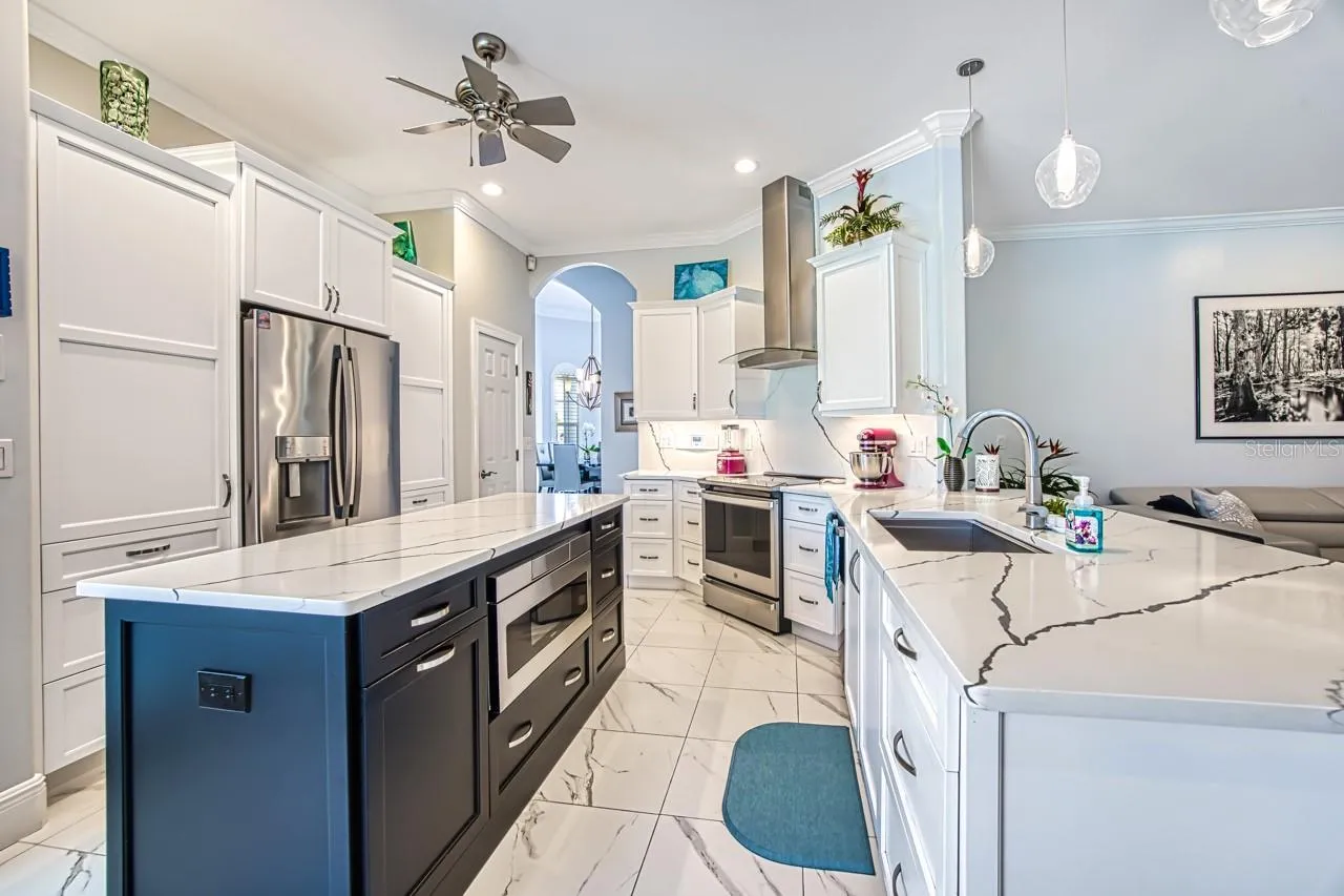 Custom cabinets with built in microwave.  Pull out drawers for easy access and tall Cabinets with pull out shelving