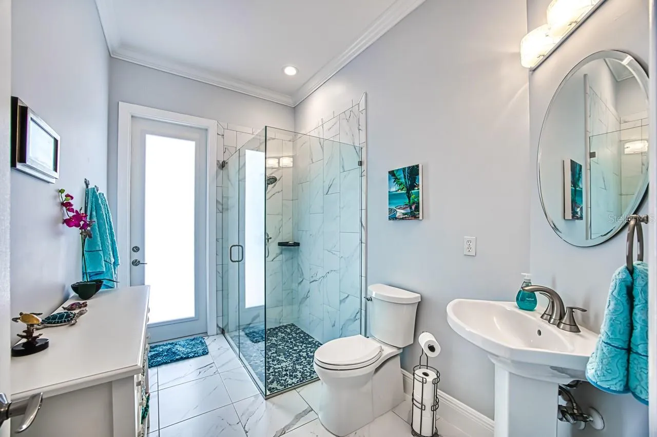 3rd full bathroom - that opens to the pool lanai