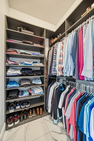 Built in his/hers wood shelving