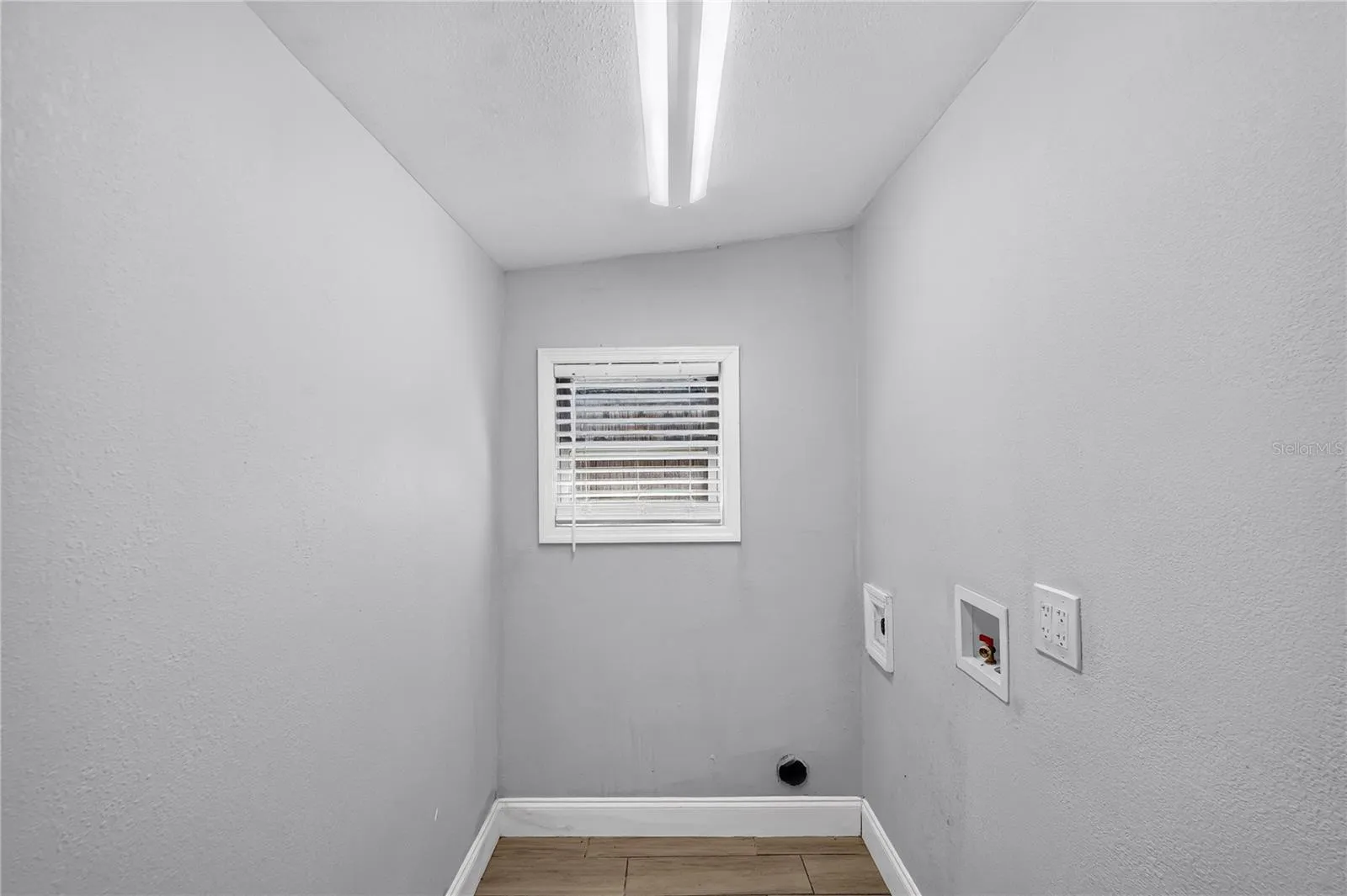 Laundry room off of kitchen