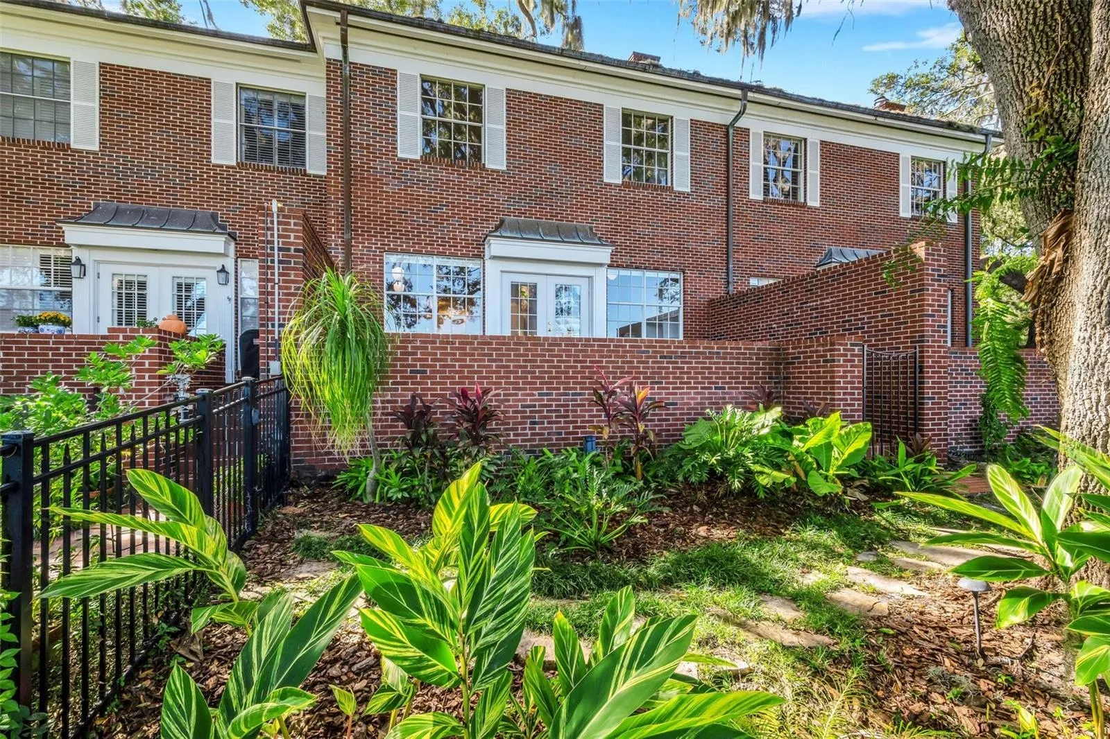 The private rear yard has plenty of room for a pet.