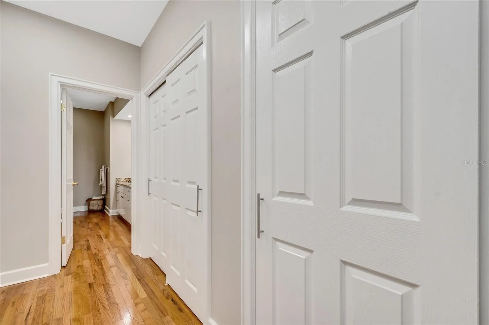 Closets flank both side of the dressing area in the Primary suite