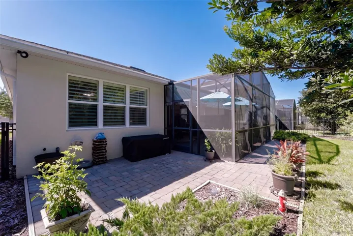 Brick paver patio outside of Screen enclosed covered Lanai