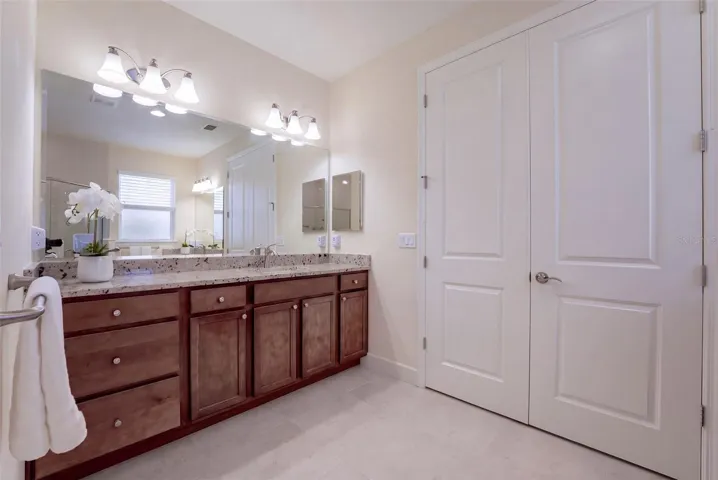 Primary Bathroom w/ double door entry into Bedroom