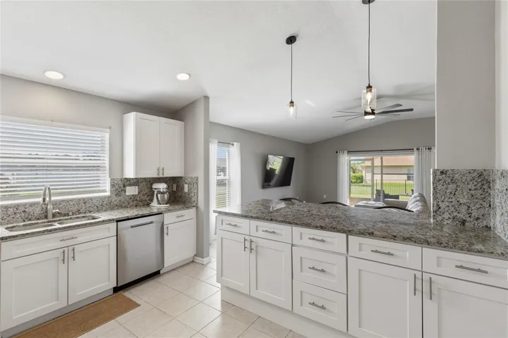 Open and updated kitchen with huge island penisular
