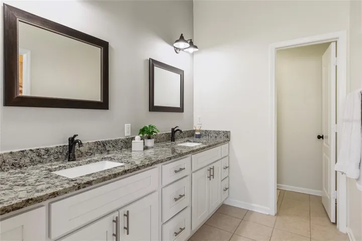 Double sink vanity with drawers and storage galore