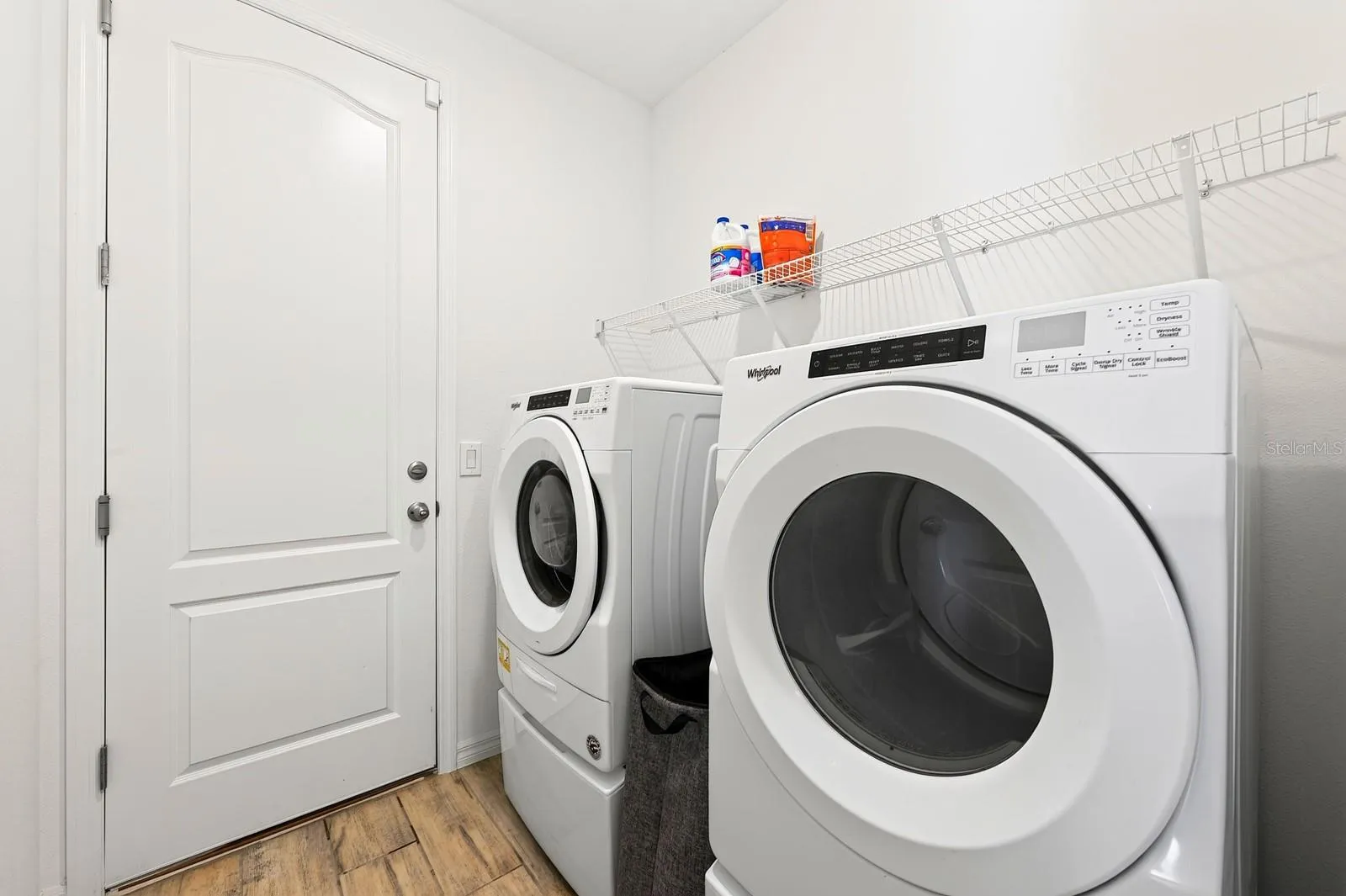 Spacious laundry room (Washer & Dryer INCLUDED) with a shelf for easy storage