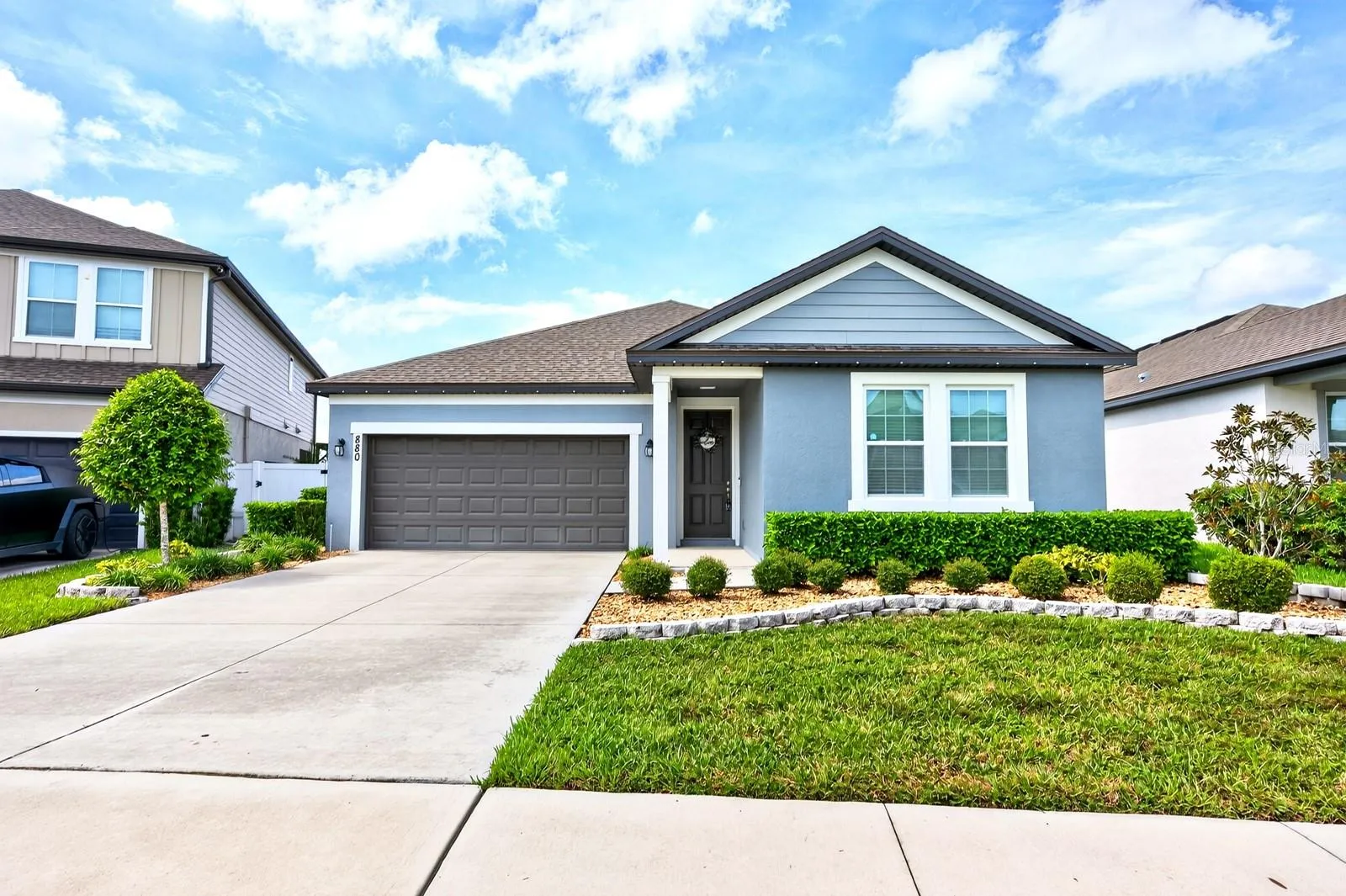 Welcome to 880 Livestock Loop in the Sunbrooke community of St. Cloud! Built in 2021, this SINGLE-STORY home offers 3 bedrooms, 2 full bathrooms, a half bath, and plenty of living space, plus an attached 2-car garage.