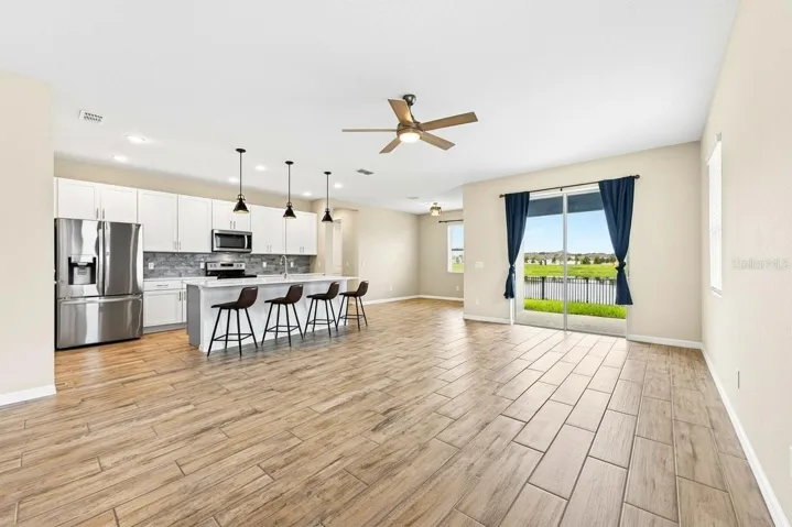 **Virtually Edited** Open-concept living space overlooked by the kitchen