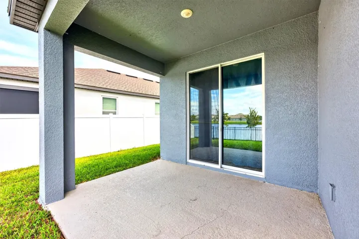 Great covered patio with a sliding door for extra natural light