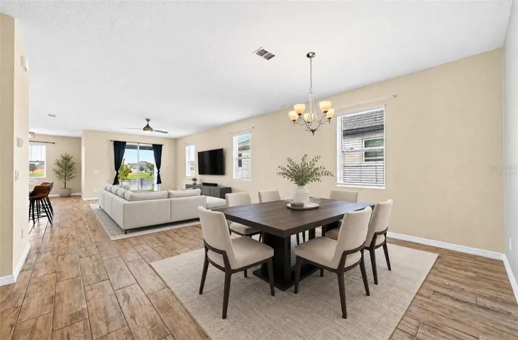 **Virtually Staged** Spacious open-concpet living/dining room as you enter the home
