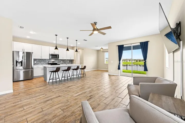 There is a ton of natural light and the TV conveys with the sale!
