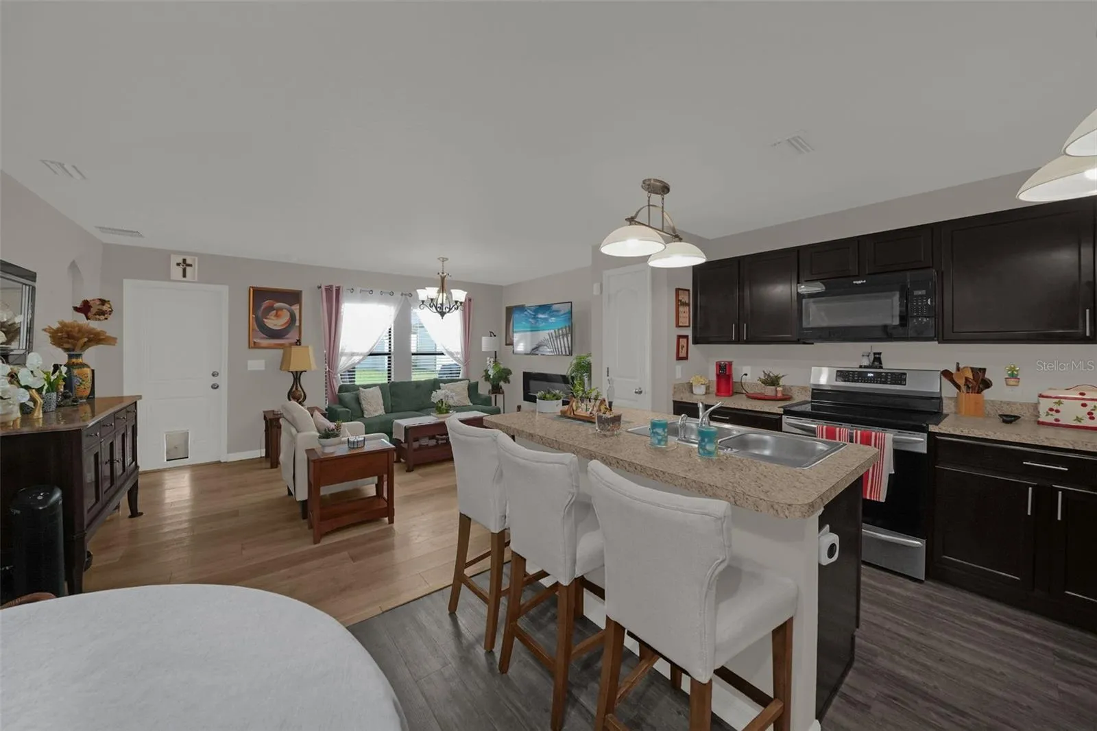 Kitchen with island and breakfast bar