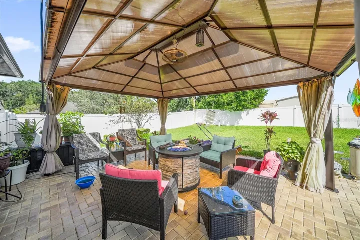 Extended brick paver patio with gazebo