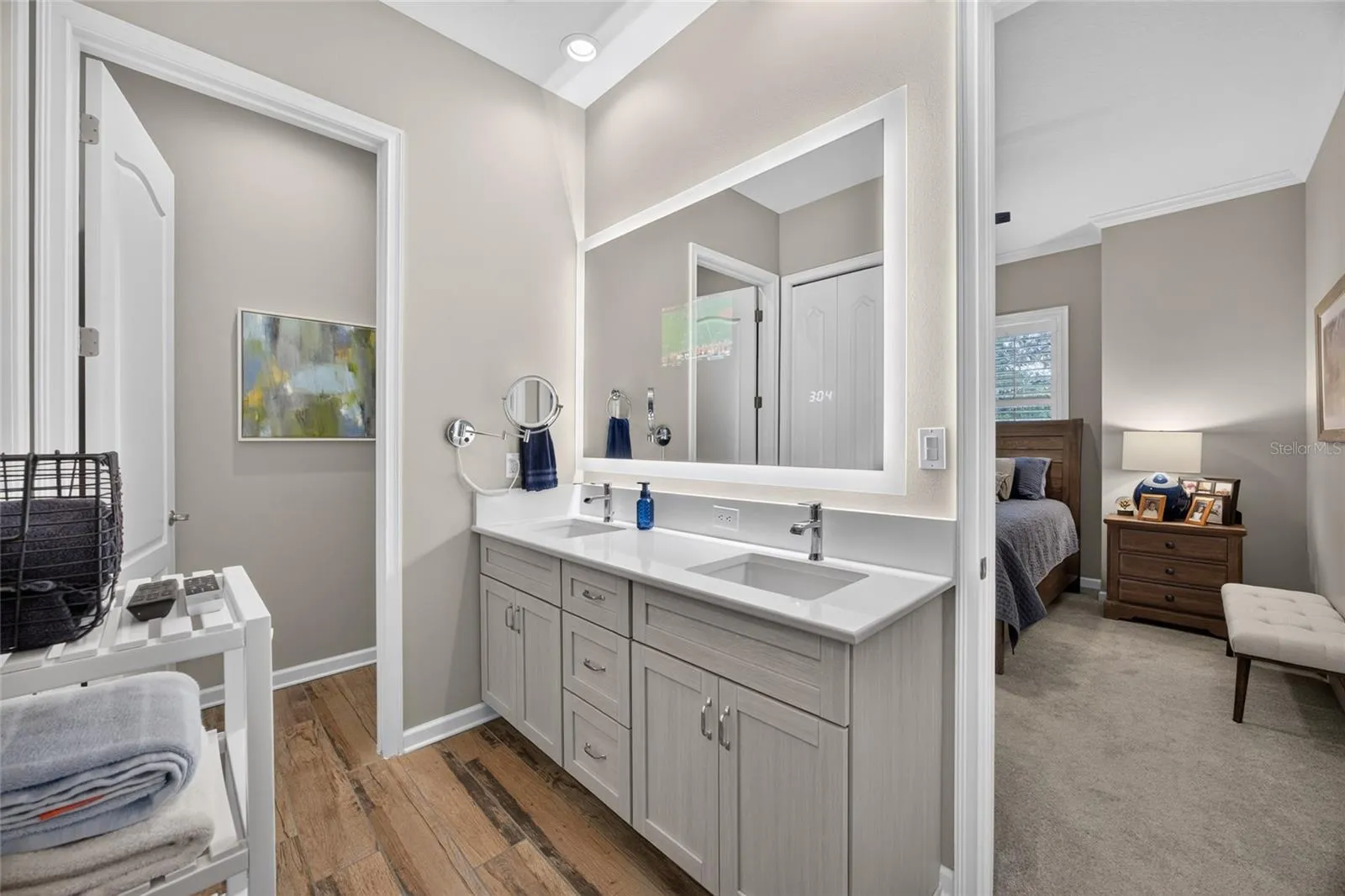 Double Vanity with Custom Seura Lighted Mirror.