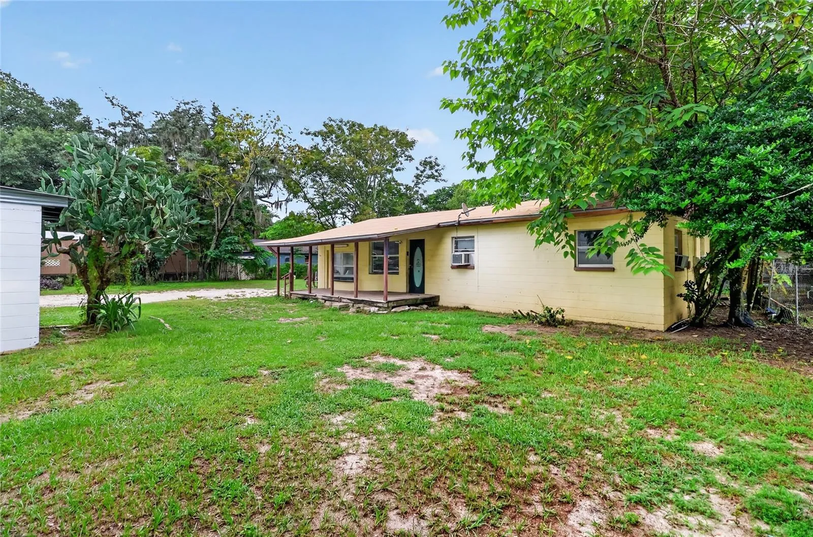 Yard between house and store