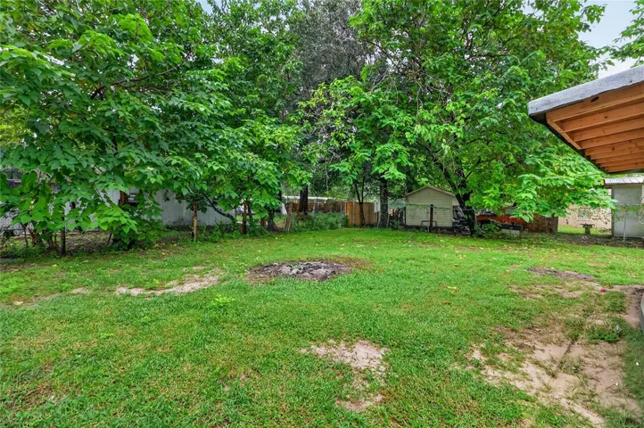 Yard between house and store