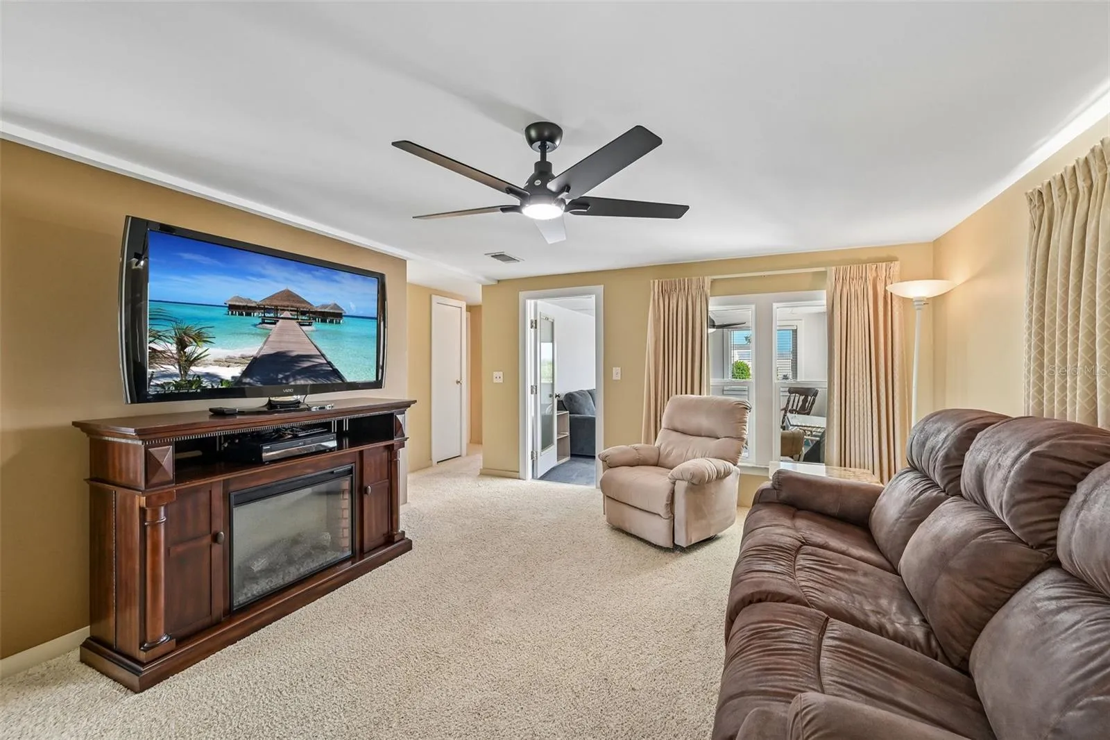 Living Room with access to Florida Room. Lots of windows!