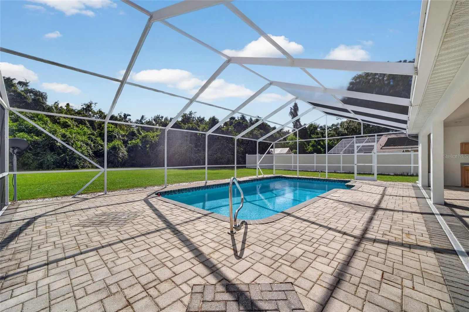 Fully treed rear line of back of property for privacy