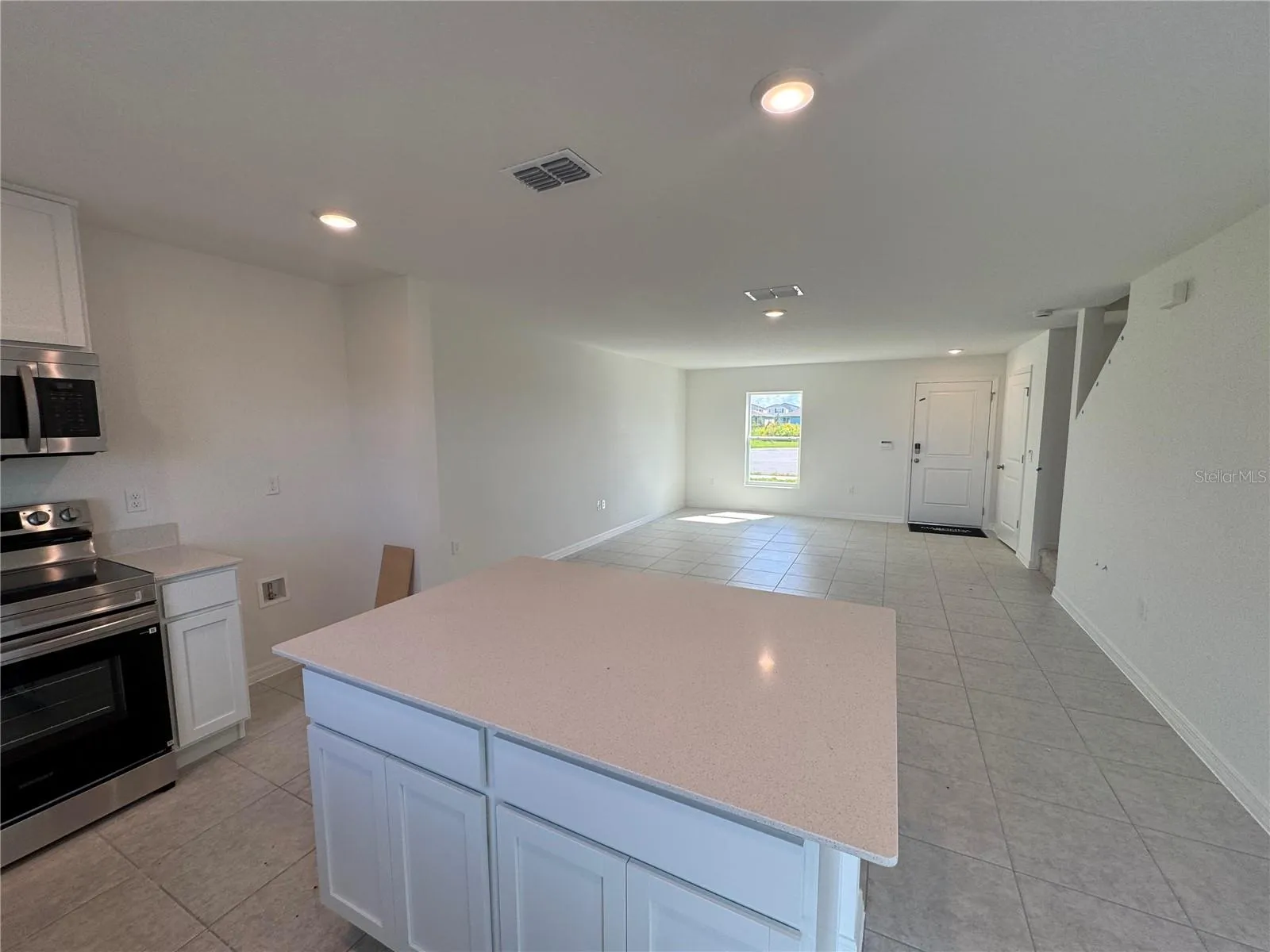 Spacious island & stainless steel appliances