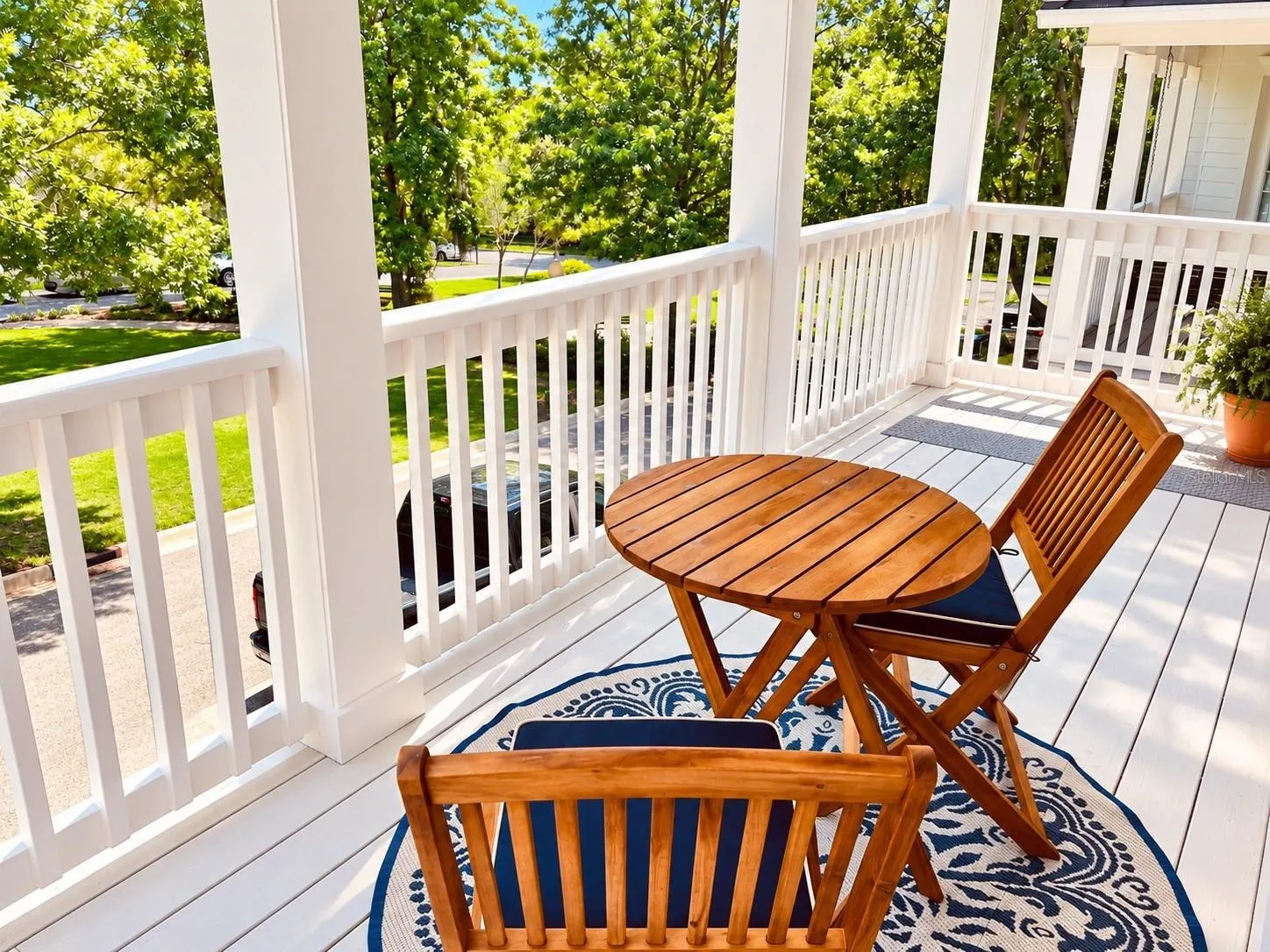 Private access to balcony  overlooking park.